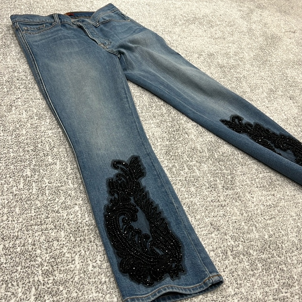 Five button Jean with embellishment on the bottom